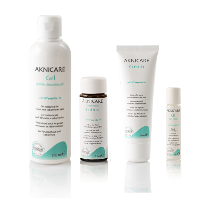 Aknicare acne skincare treatment product lineup on a white background